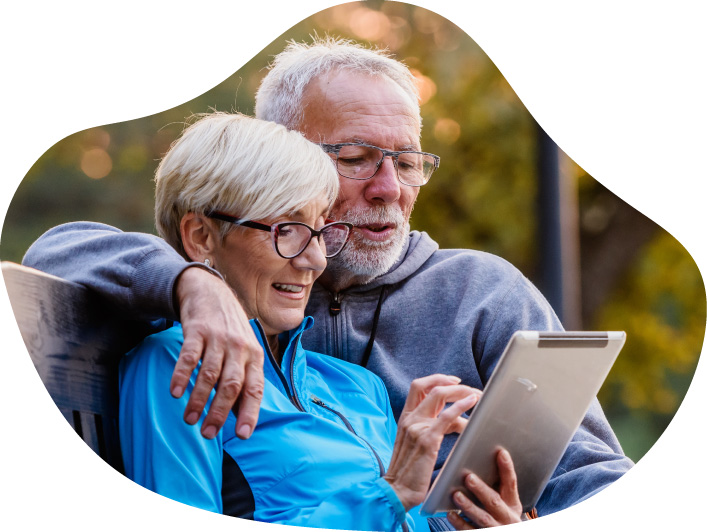 Older Couple Looking at Tablet Older Couple Looking at Tablet